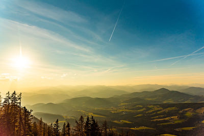 Scenic view of mountains against sky during sunset