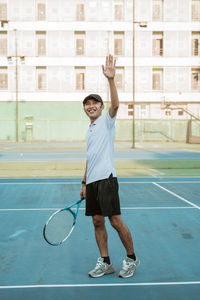 Young man playing tennis