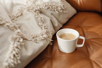 Close-up of coffee on bed