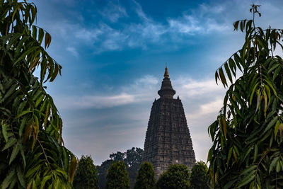 Mahabodhi temple buddhist stupas isolated with bright sky and unique prospective