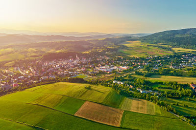 Mountain village and agricultural fields, aerial view. nature landscape