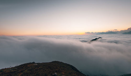 Scenic view of mountains against sky during sunset