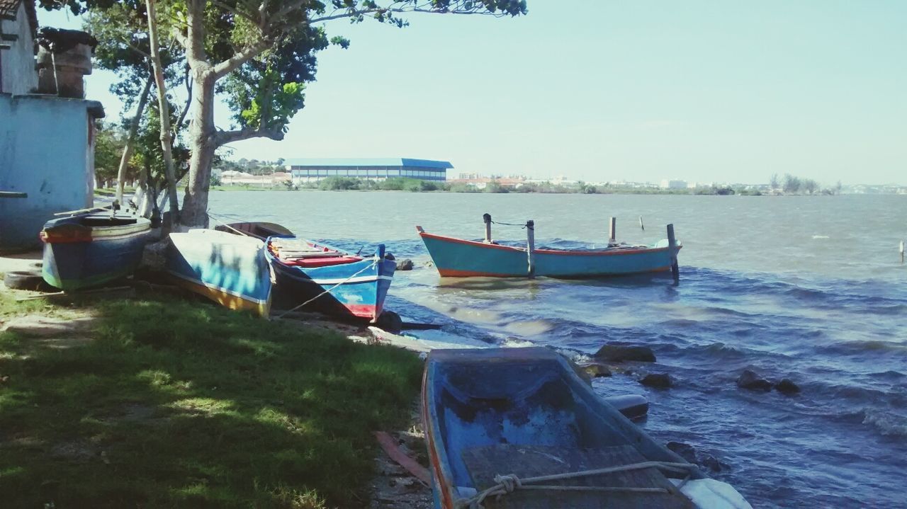 nautical vessel, boat, transportation, moored, mode of transport, water, clear sky, sea, rowboat, nature, tranquility, day, tree, copy space, tranquil scene, travel, no people, outdoors, lake, river