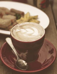 Close-up of coffee cup on table