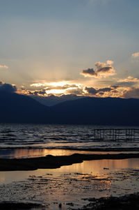 Scenic view of sea against sky during sunset