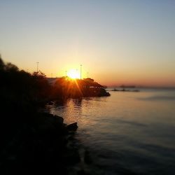 View of calm sea at sunset