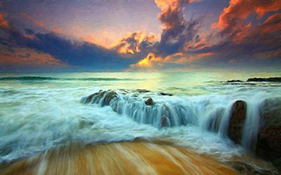 Scenic view of sea against dramatic sky during sunset