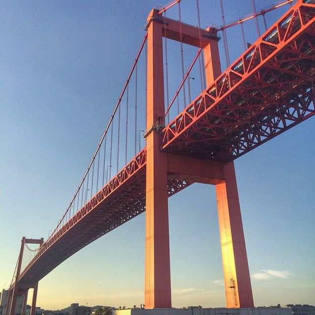 connection, bridge - man made structure, engineering, built structure, architecture, low angle view, suspension bridge, bridge, transportation, travel destinations, clear sky, international landmark, metal, sky, golden gate bridge, famous place, long, support, cable-stayed bridge, blue