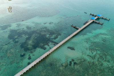 Aerial view of pier in sea