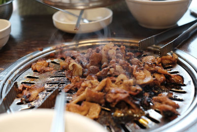 High angle view of meat in plate on table