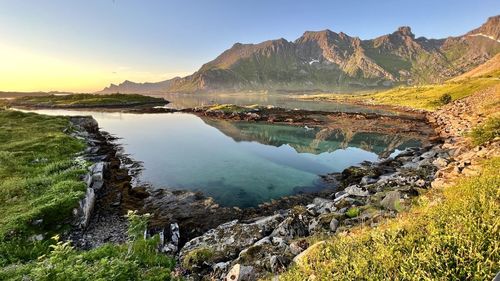 Scenic view of lake against sky during sunset