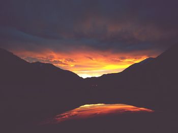 Scenic view of mountains at sunset