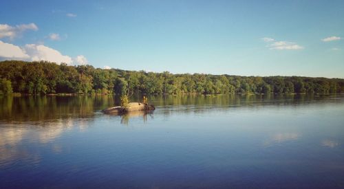 Scenic shot of reflection of trees in calm lake