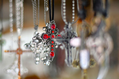Cross pendants hanging at market stall