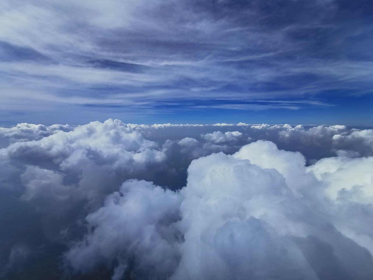 LOW ANGLE VIEW OF CLOUDS AGAINST BLUE SKY