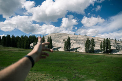 Midsection of person against sky