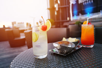 Drinks served on table at restaurant during sunset