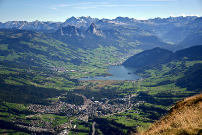 Aerial view of landscape and mountains against sky