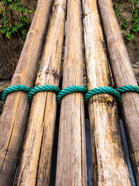 Dried bamboo tie with green nylon rope as a small bridge