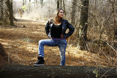 Portrait of teenage girl in forest