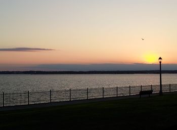 Scenic view of sea at sunset