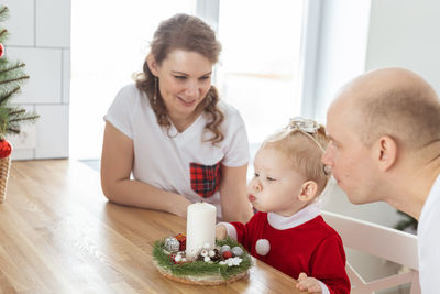 Mother playing with toys at home