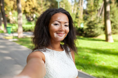 Portrait of young woman looking away