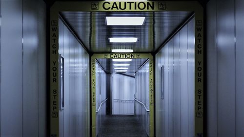 Empty corridor with cordon tape