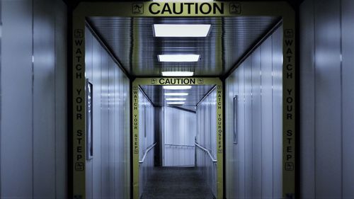 Empty corridor with cordon tape