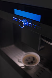 Close-up of coffee cup on table