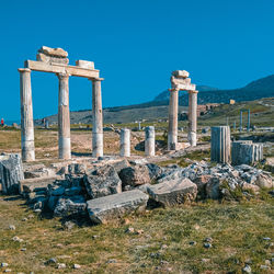 Old ruin structure against blue sky