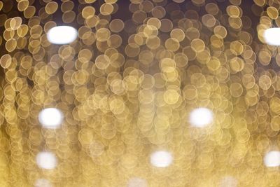 Low angle view of illuminated light bulb