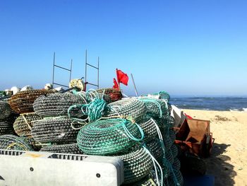 Fishing net in sea against clear sky