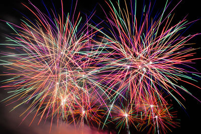 Low angle view of firework display