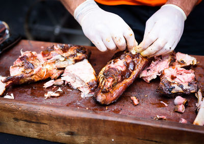 Cropped image of chef preparing food