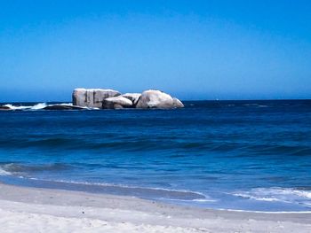 Scenic view of sea against clear sky