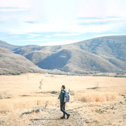 Full length of man standing on mountain