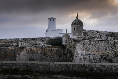 Low angle view of old building against sky