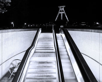Low angle view of illuminated staircase at night