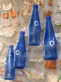 Close-up of blue plastic bottle