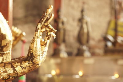 Buddha statue with gold leaf adornment at wat yai chai mongkhon temple, ancient city of ayudhaya,