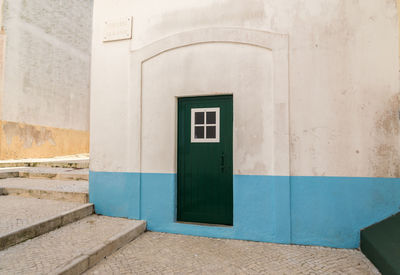 Open door of building