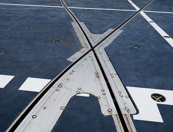 High angle view of airplane on road in city