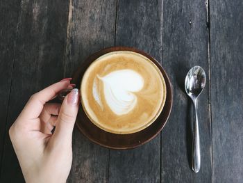 High angle view of coffee cup on table