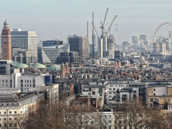 High angle view of buildings in city against sky
