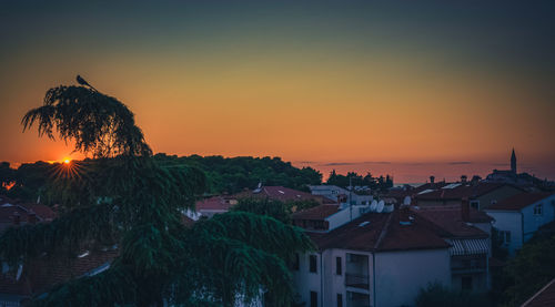 High angle view of townscape against sky at sunset
