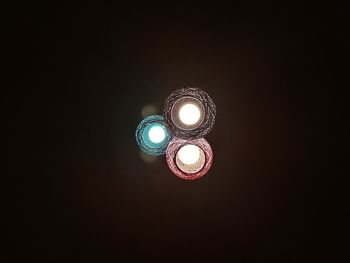 Illuminated light bulbs in darkroom