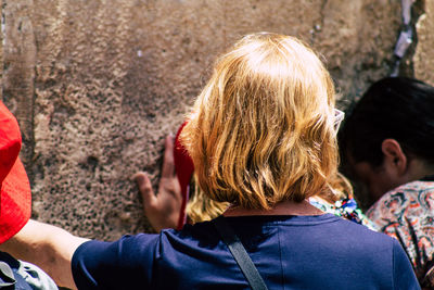Rear view of people in traditional clothing
