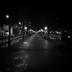 Illuminated street lights at night