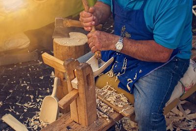 Man working on wood